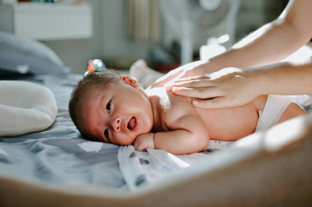 Discover the benefits of newborn massage.